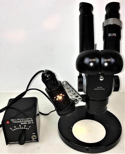Used International Binocular Stereo Microscope with 20-D Transformer and Lamp - 4X to 25X