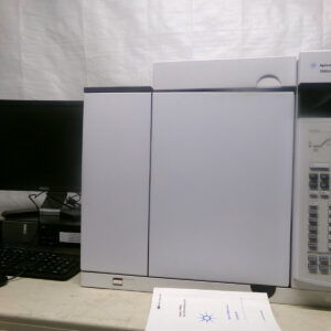 A computer and an Agilent Technologies GC System.