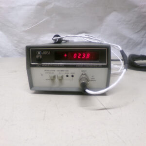 A gray box with a red LED display that reads "023.8".