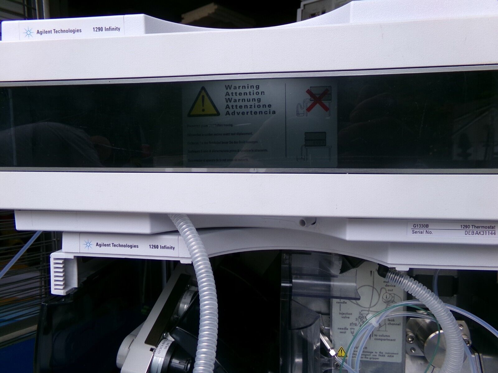 Black and white warning label on a laboratory instrument