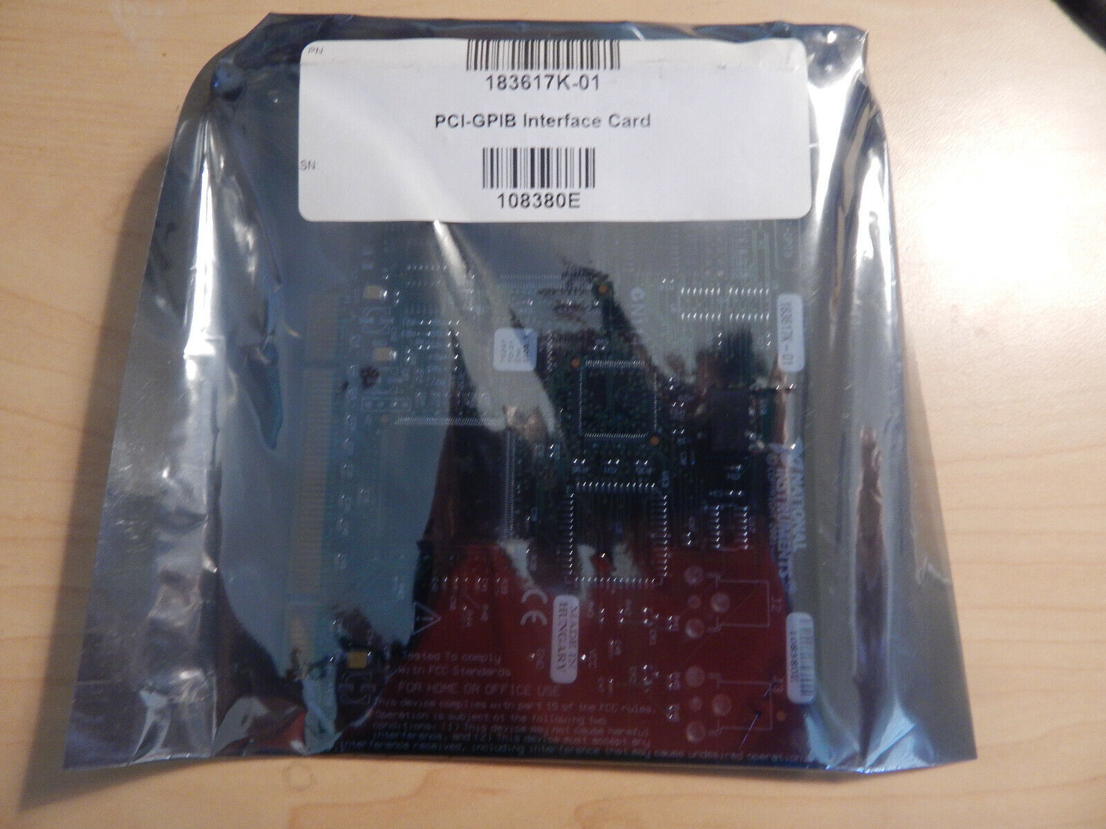 A photo of a PCI-GPIB Interface Card in its anti-static bag.