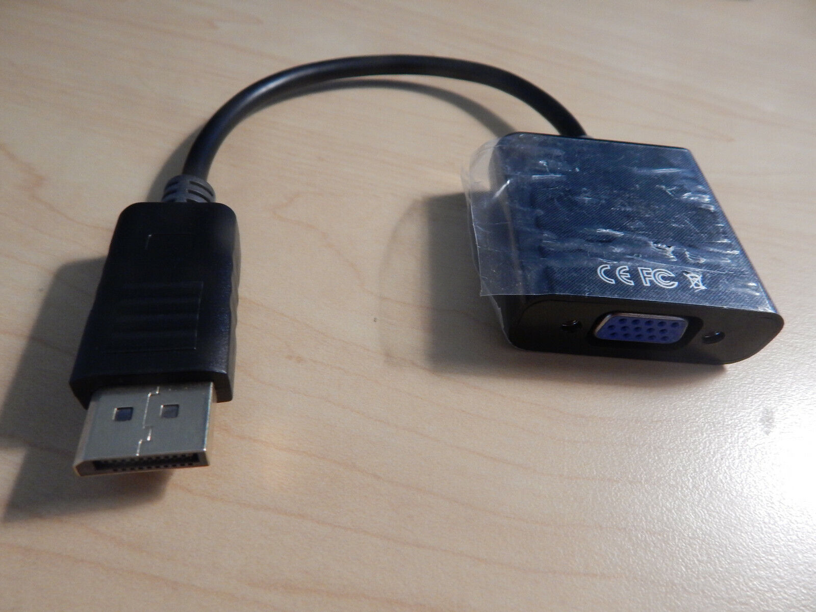 Black DisplayPort to VGA adapter.