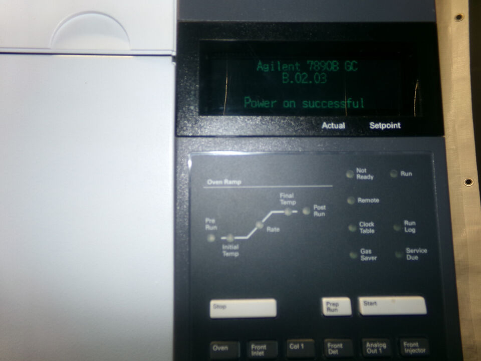 A gas chromatograph with a control panel.